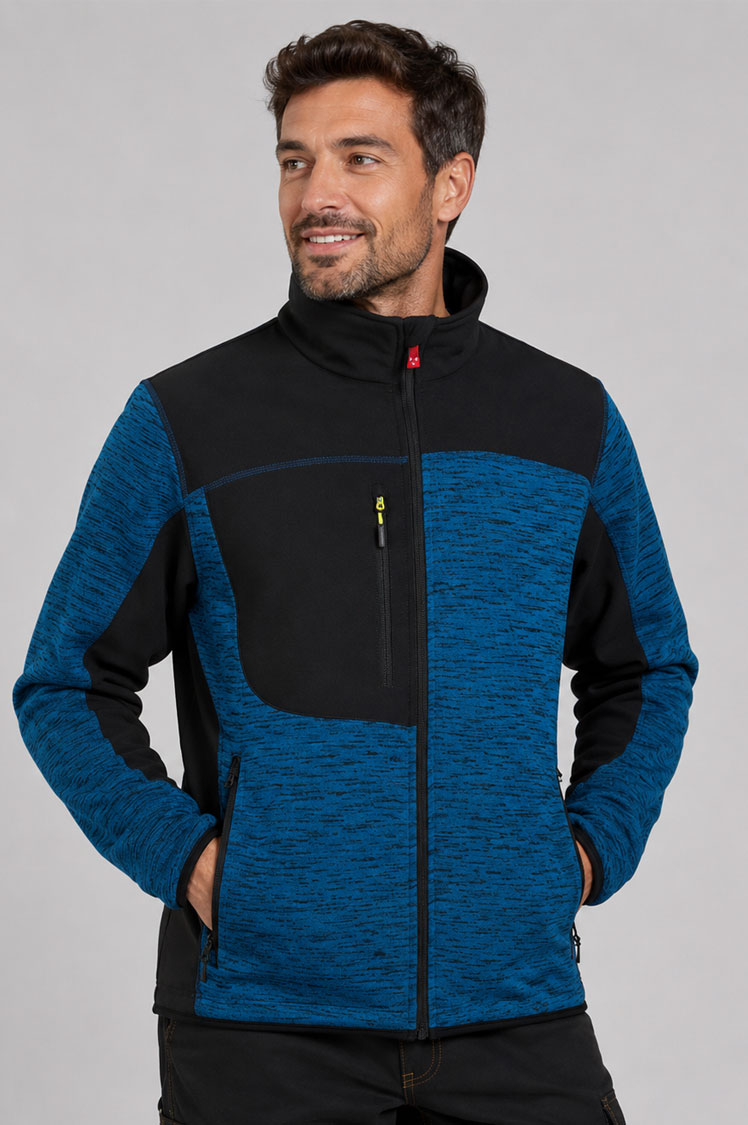 chaqueta técnica Travel con inserciones Softshell, ideal para ropa laboral y actividades al aire libre.