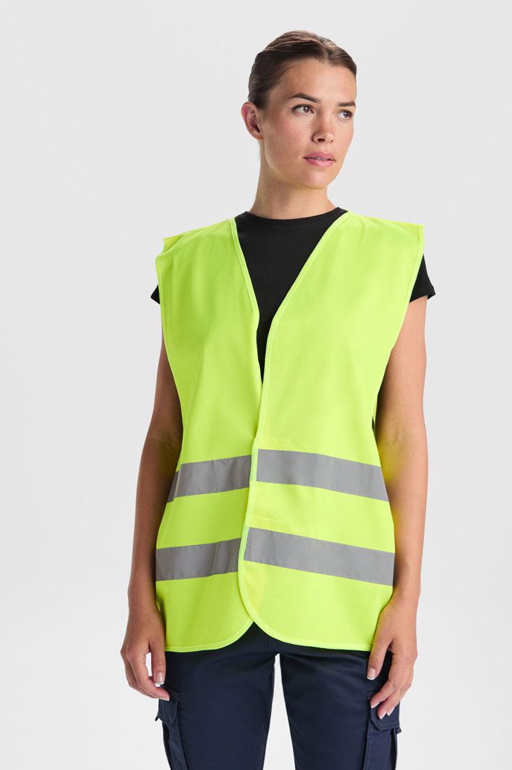 Chaleco básico de alta visibilidad amarillo con dos bandas reflectantes para trabajo y uso profesional.